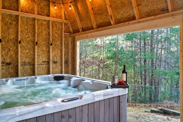 A hot tub in a custom shed
